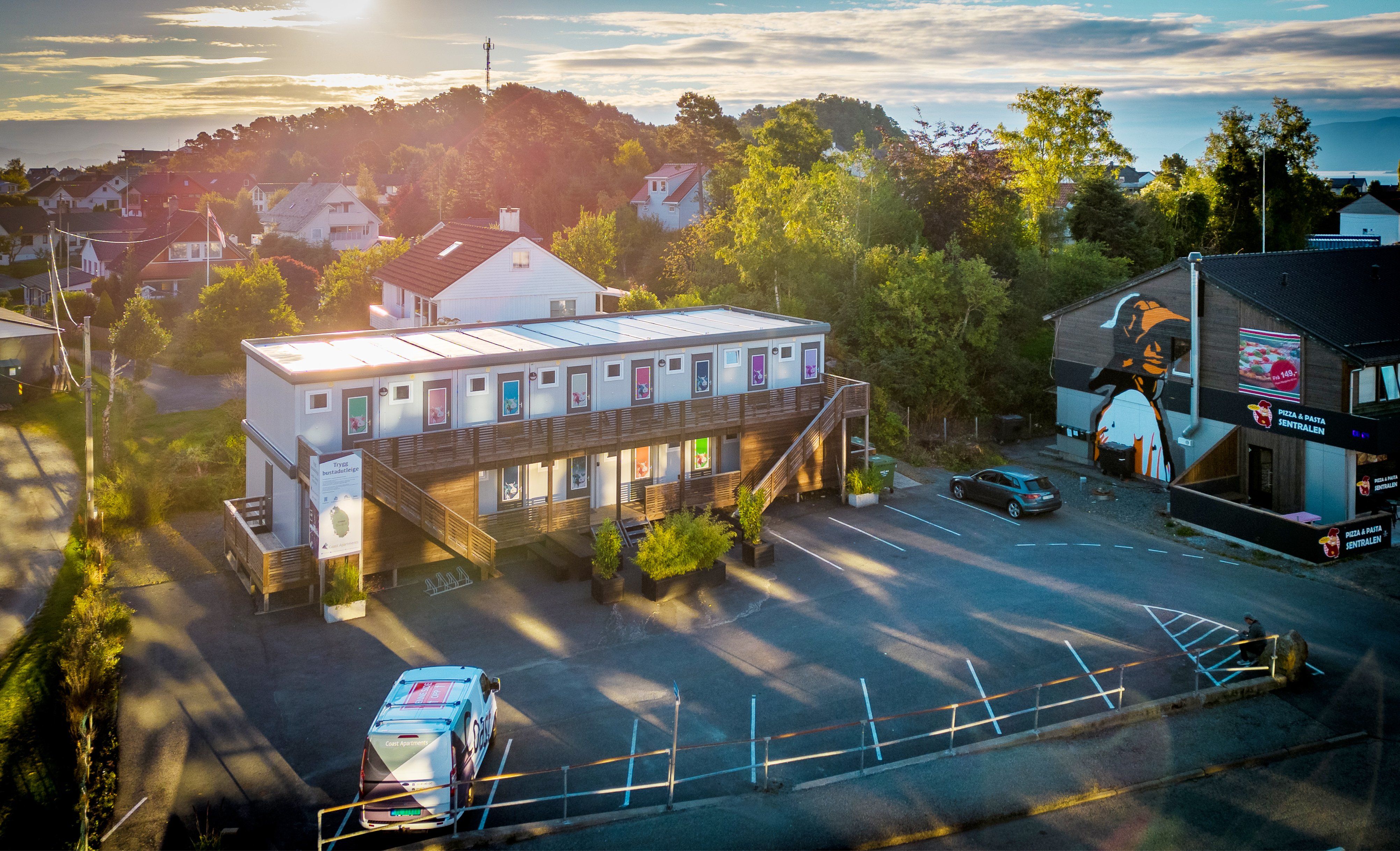 Two-storey Containex modular building complex with external staircase and walkway